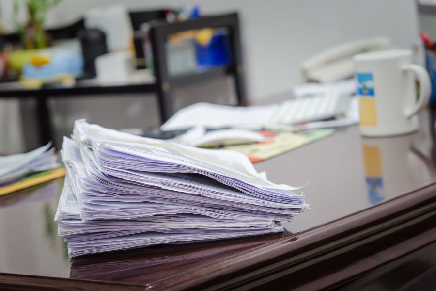 stack of documents on a desk